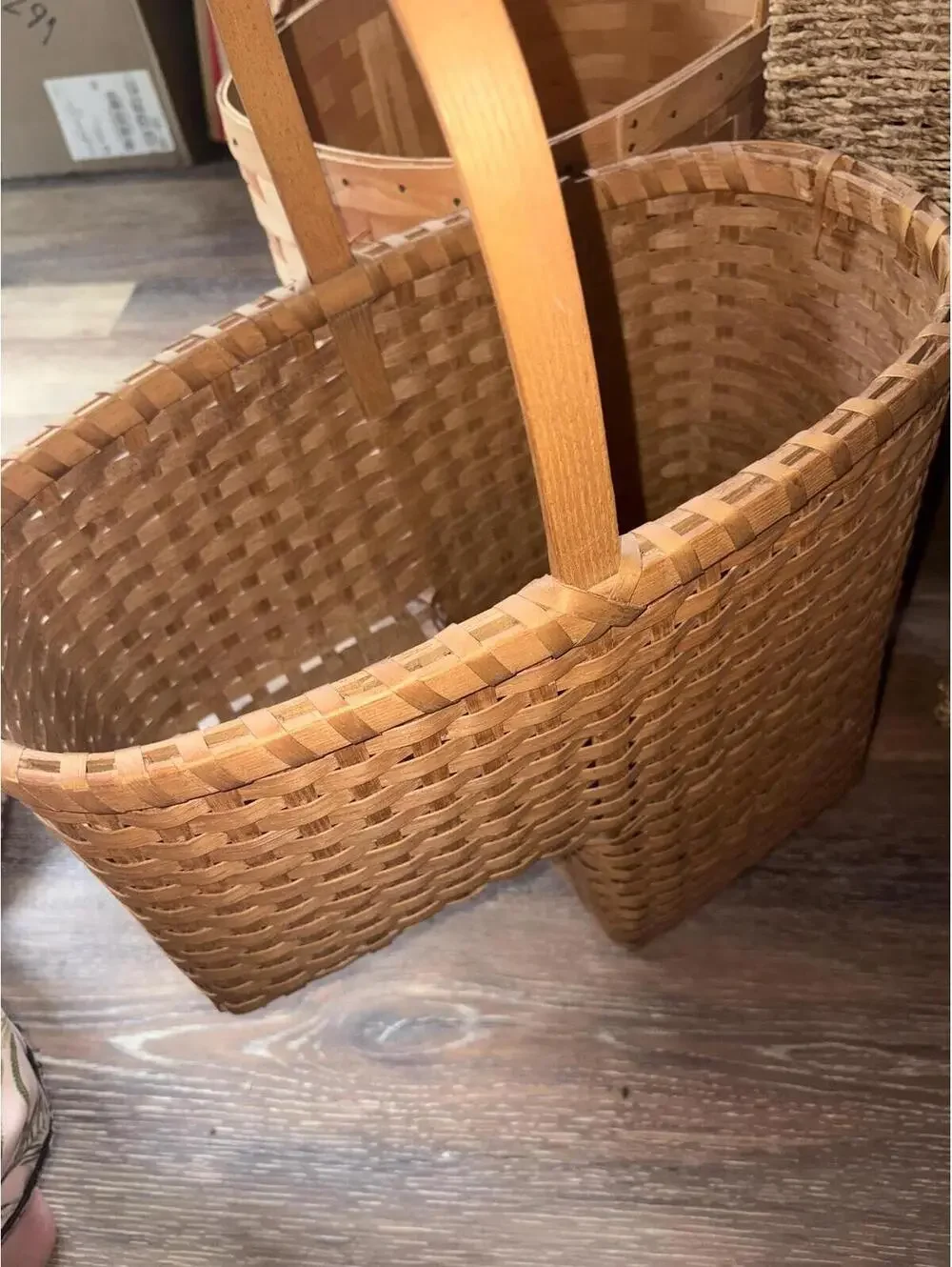 Woven reed stair-step storage basket.Vintage